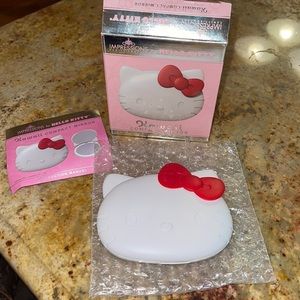 Brand new Impressions hello kitty compact mirror.